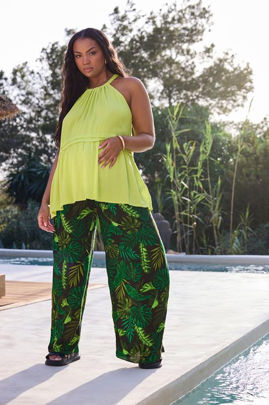 BUMP IT UP MATERNITY Curve Black & Green Palm Print Trousers