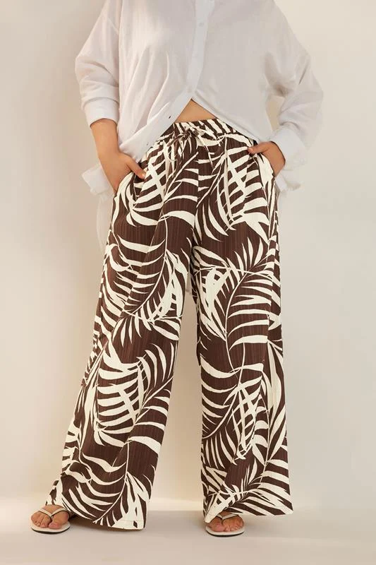 YOURS Curve Brown Palm Print Textured Wide Leg Trousers