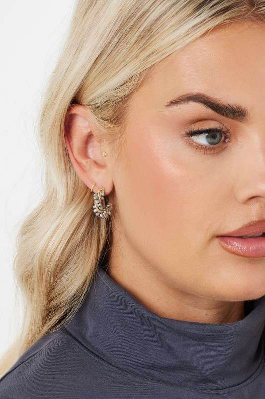 Gold Tone Diamante Twisted Hoop Earrings