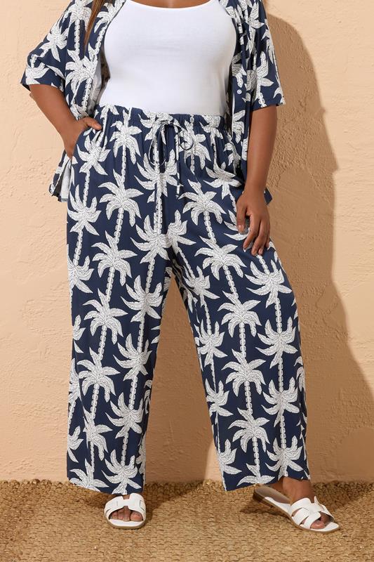 YOURS Curve Navy Blue Tropical Palm Wide Leg Trousers