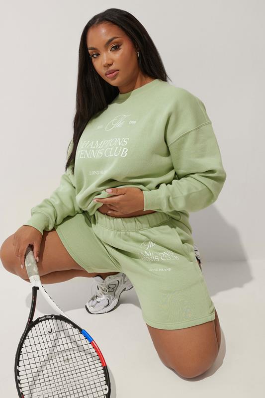 LIMITED COLLECTION Curve Green'Hamptons Tennis Club' Slogan Jogger Shorts