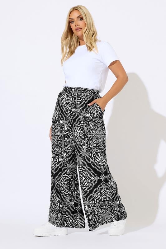 YOURS Curve Black Bandana Print Textured Wide Leg Trousers
